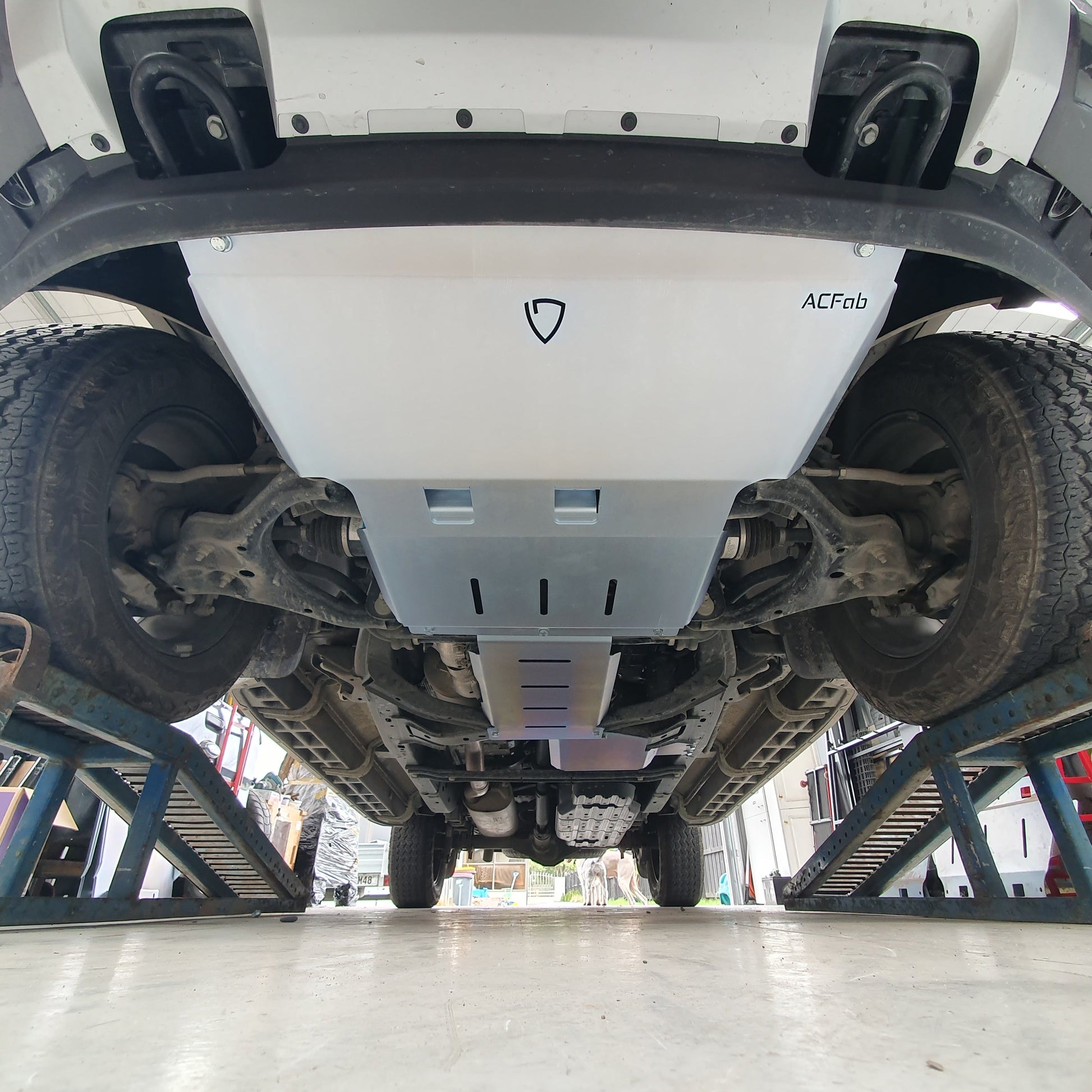 Undercarriage view of a vehicle showing the installed bash plates on the Ford Ranger Next Gen RA 2022+.